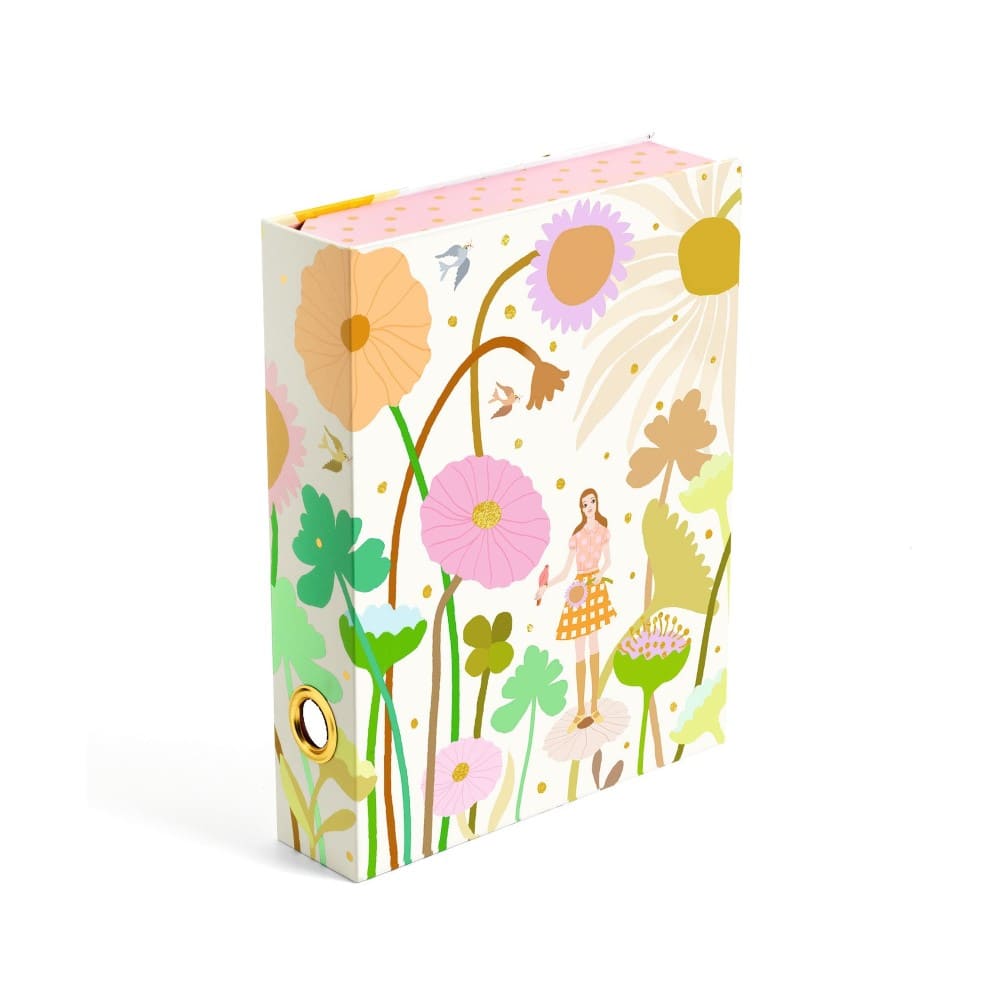 Cardboard box with floral design and a person in a field of flowers on a white background