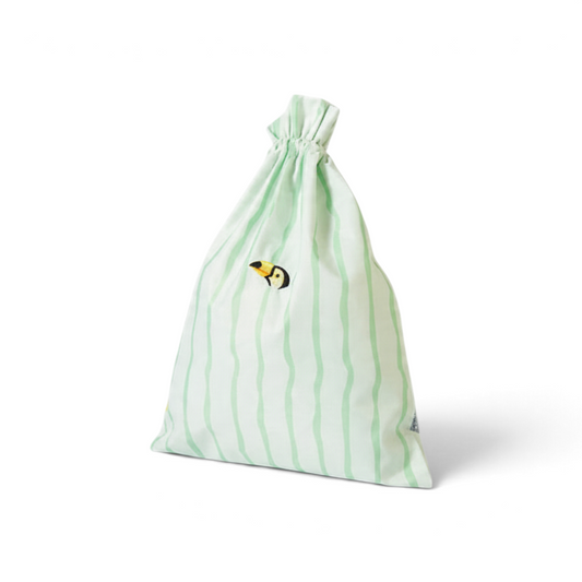 One Two Play Mint Mambo laundry bag for kids with green wavy stripes and a small toucan bird detail.