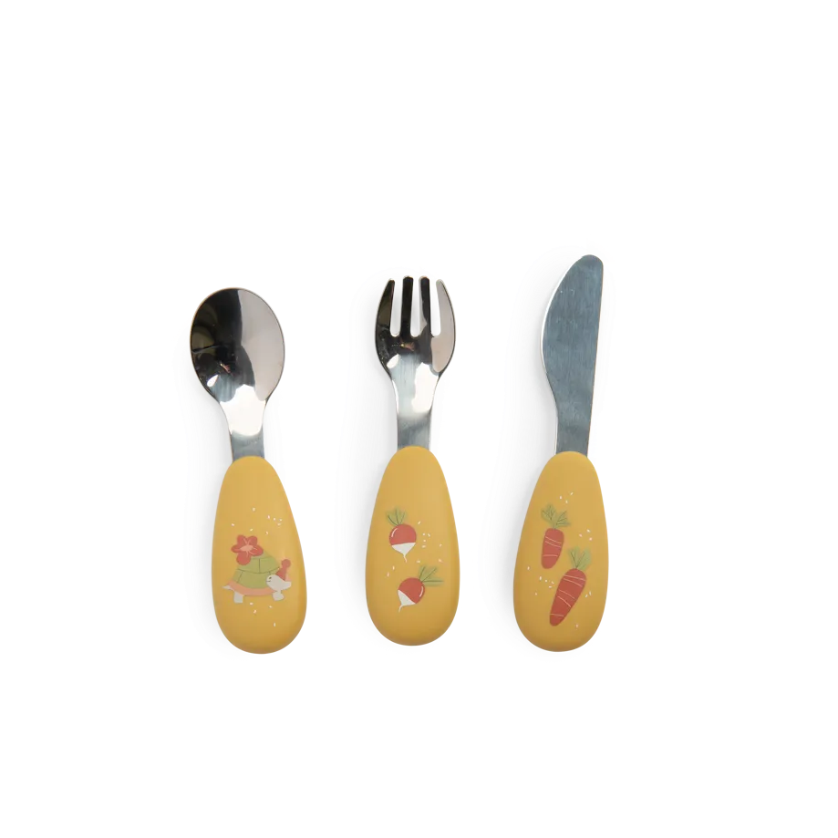 Three-piece children's cutlery set with yellow handles decorated with illustrations of carrots, strawberries, and a bunny, and silver stainless steel blades.