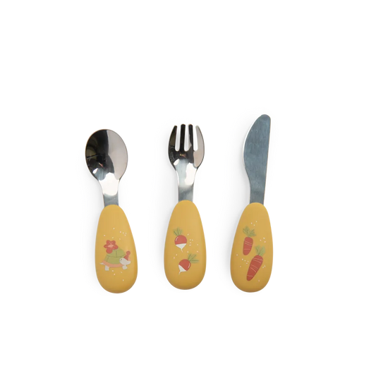 Three-piece children's cutlery set with yellow handles decorated with illustrations of carrots, strawberries, and a bunny, and silver stainless steel blades.