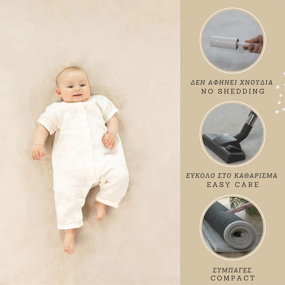 Baby in a white onesie lying on a beige surface with text about product features.