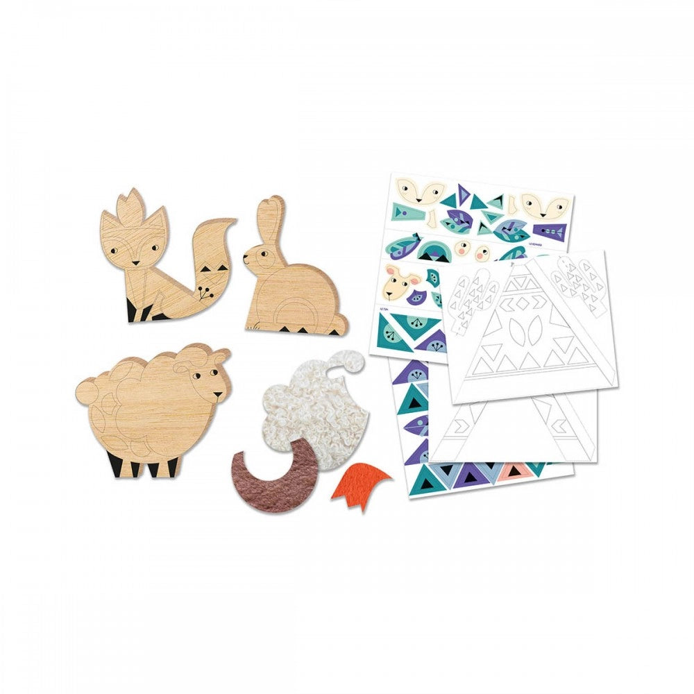 Wooden animal toys and coloring sheets on a white background