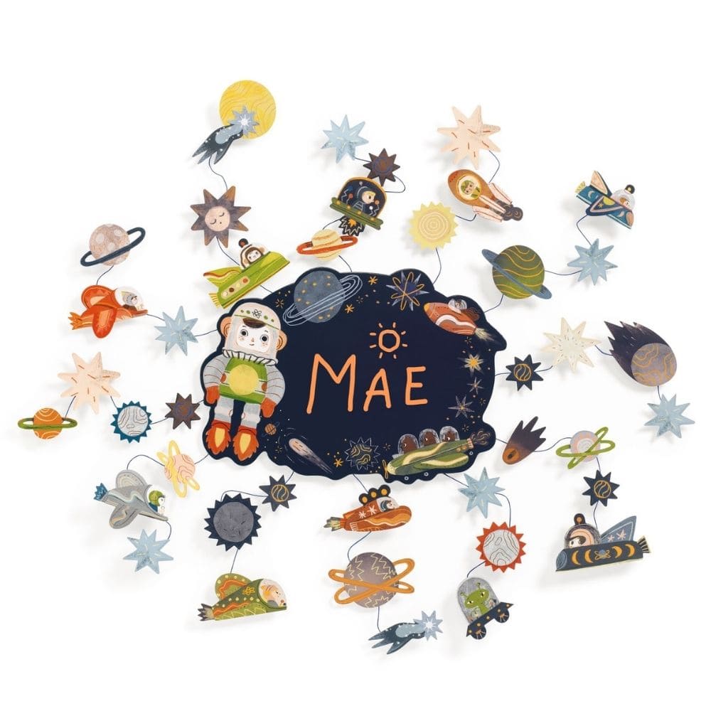 Decorative wall hanging with space-themed elements and the name 'MAE'.