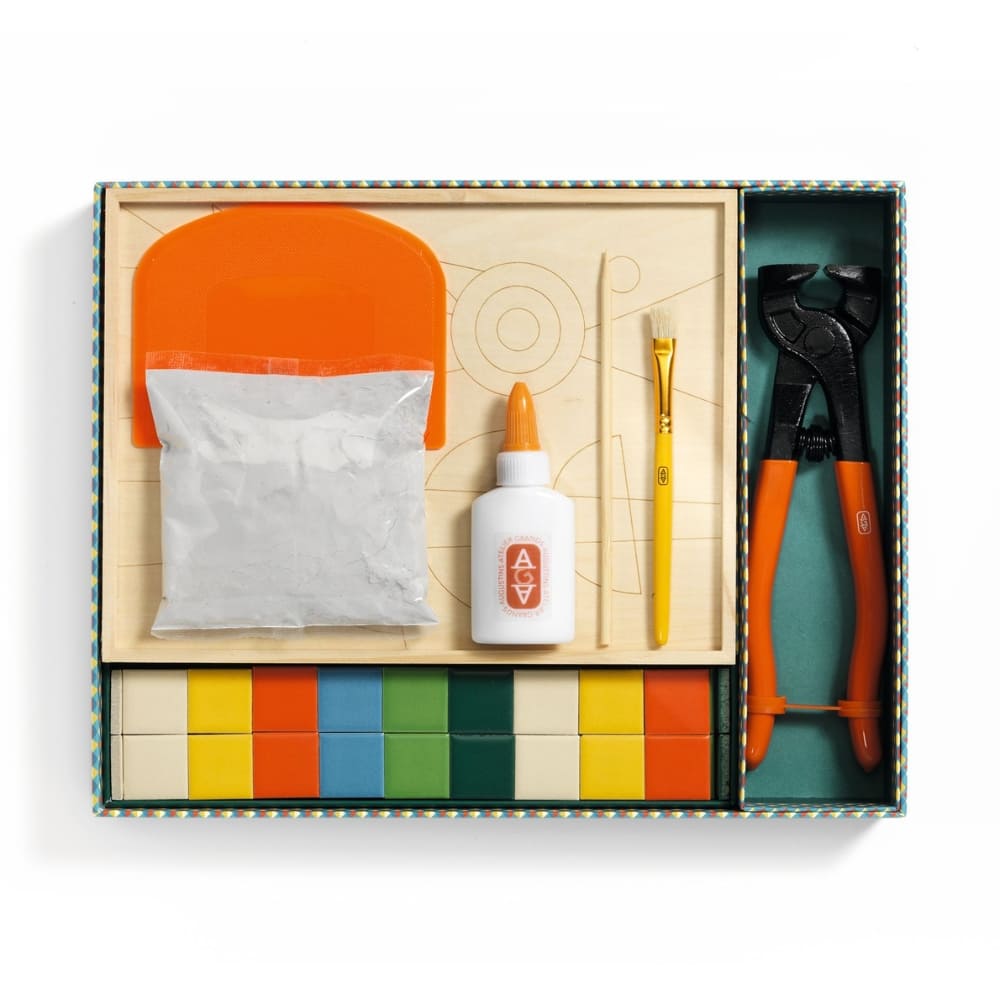 Set of tools and items in a box with colorful stripes on a white background
