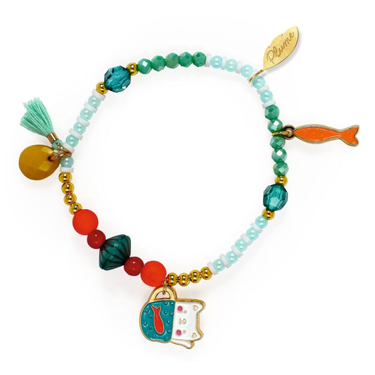 Colorful beaded bracelet with charms on a white background
