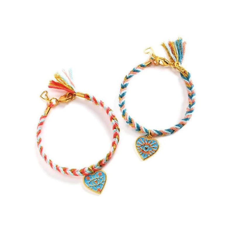 Two colorful bracelets with heart charms on a white background