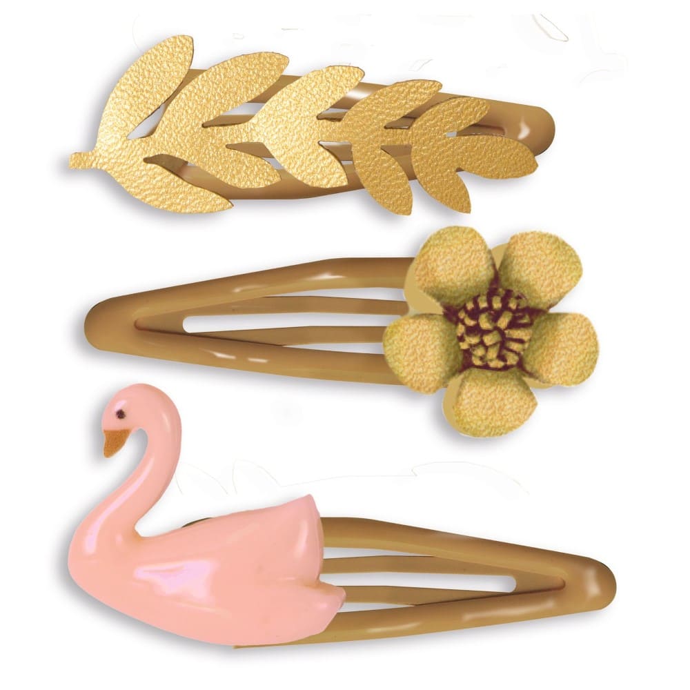 Set of hair clips including a swan, leaf, and flower design on a white background