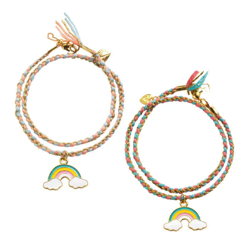 Two colorful bracelets with rainbow charms on a white background