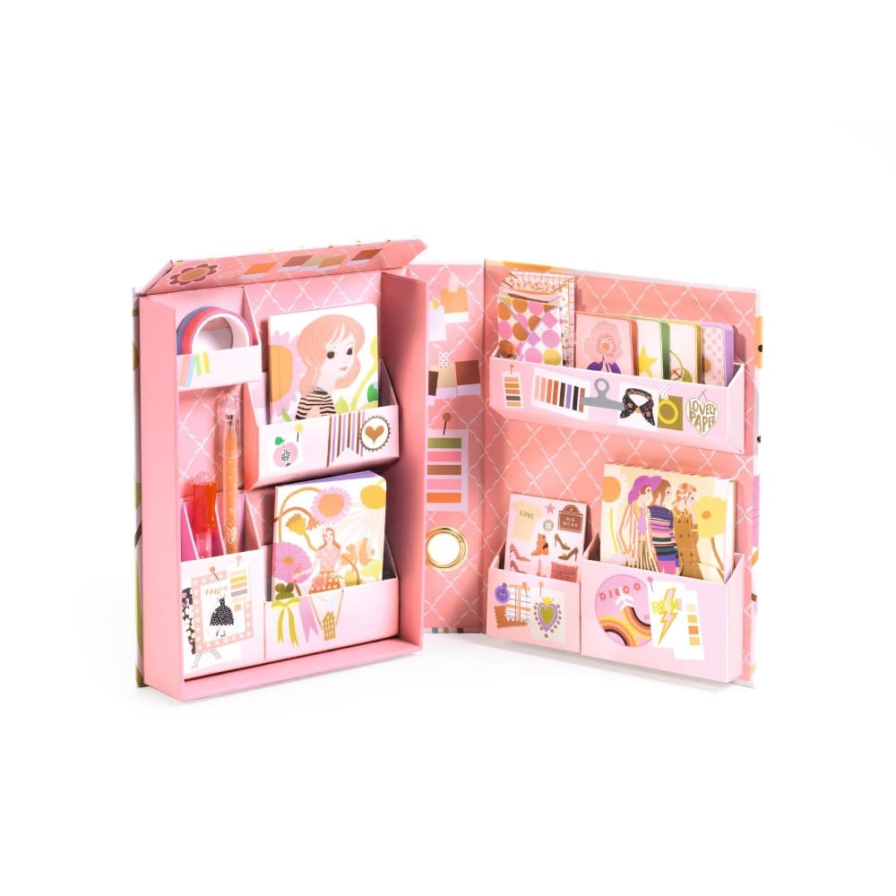 Pink stationery set with various items including a pen, stickers, and cards on a white background.