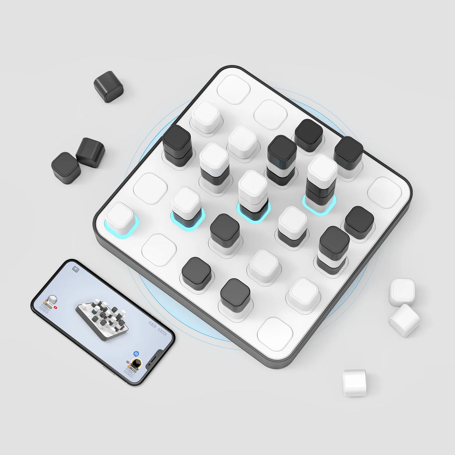 Board game with black and white pieces on a light gray background, accompanied by a smartphone displaying the game.