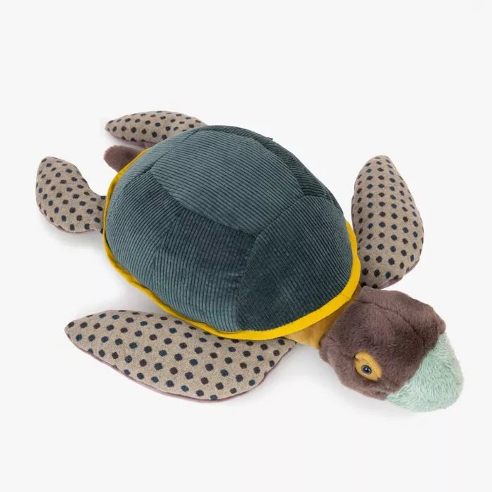 Plush turtle toy with green shell and brown body on a white background