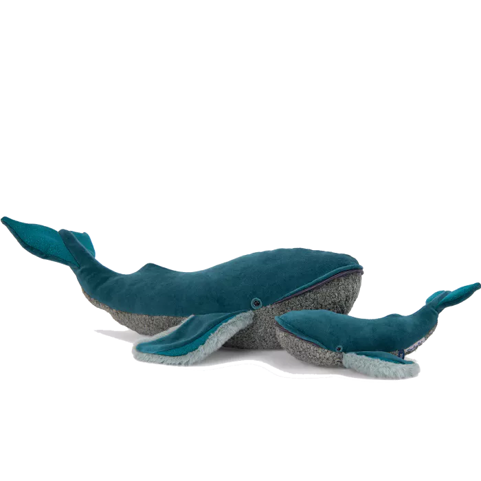 Blue whale-shaped toy on a white background