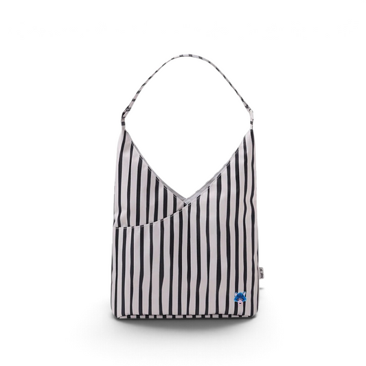 One Two Play Mistwood shoulder bag for kids in a black and white striped pattern with a small HugZ animal patch.