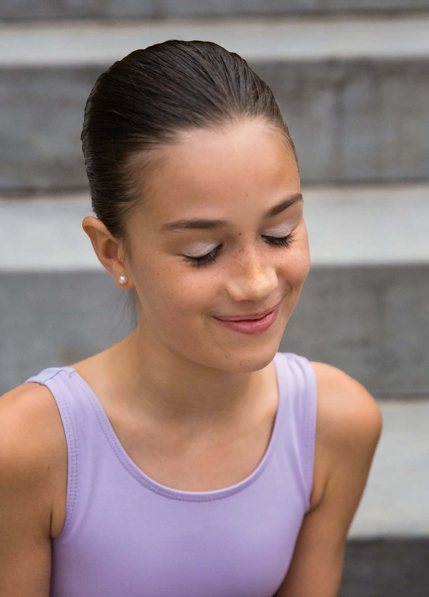 Young girl wearing One Two Play winter-themed eyeshadow with a subtle shimmer, perfect for creative pretend play.
