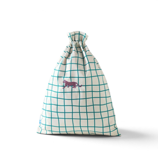 One Two Play Rainwalk laundry bag for kids featuring a white and teal grid pattern with a small purple tiger icon.