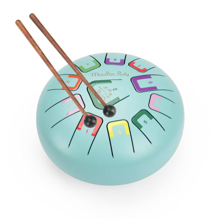 Colorful wooden drum with drumsticks on a white background