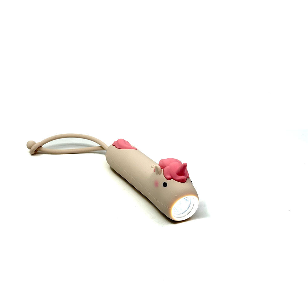 Small flashlight shaped like a mouse with a pink bow on a white background